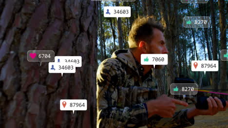 hunter crouching and aiming crossbow in pine forest, showing social media marketing icons