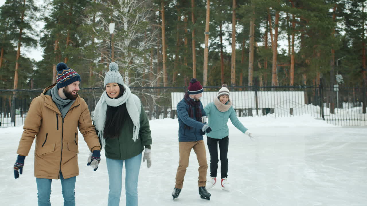 Friends Ice Skating in Winter Park