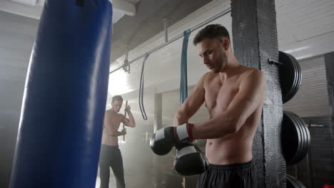 men boxing in the gym