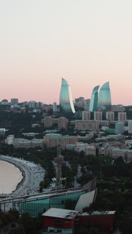 stunning sunset view of baku, azerbaijan with the iconic flame towers