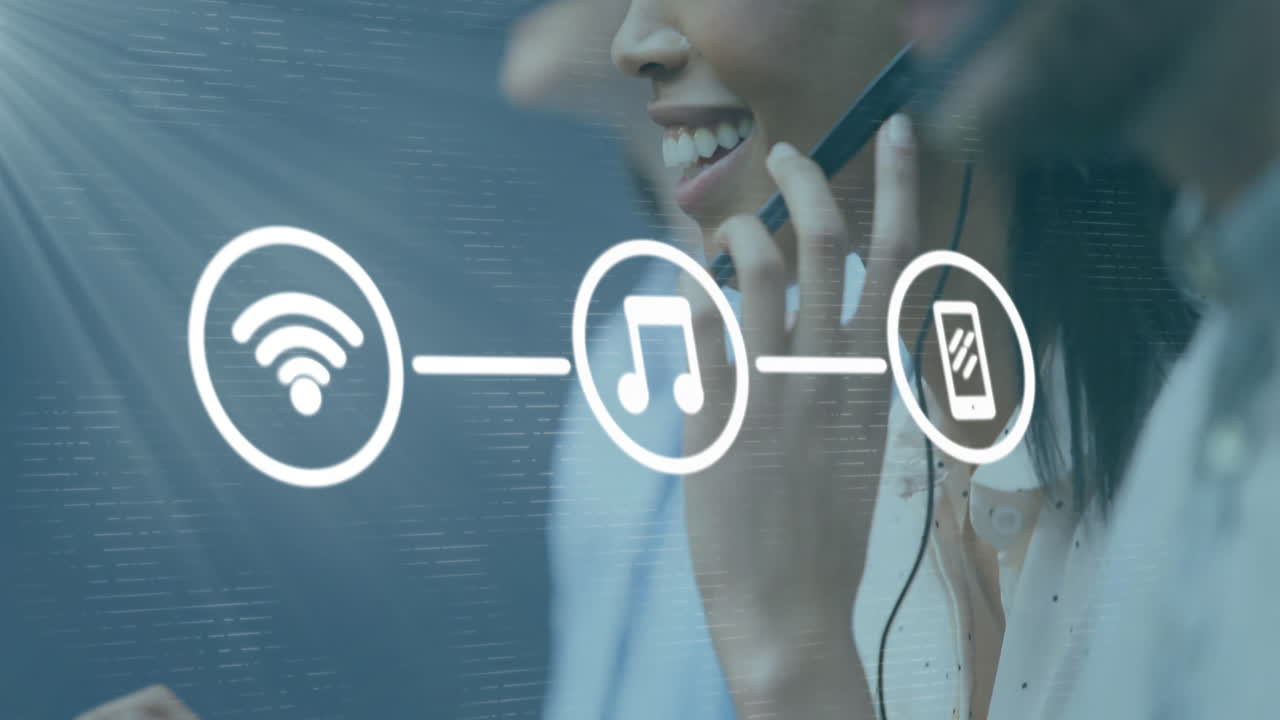 Animation of network of icons over diverse business people with phone headsets