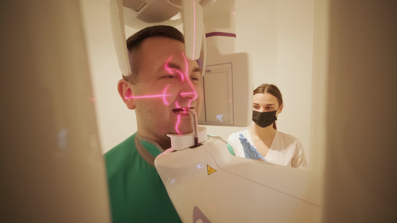 Patient Undergoing Dental X-Ray with Technician