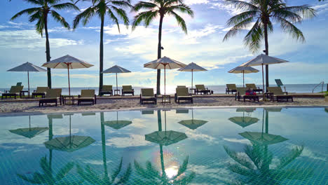 beautiful umbrella and chair around swimming pool in hotel and resort - vacation concept