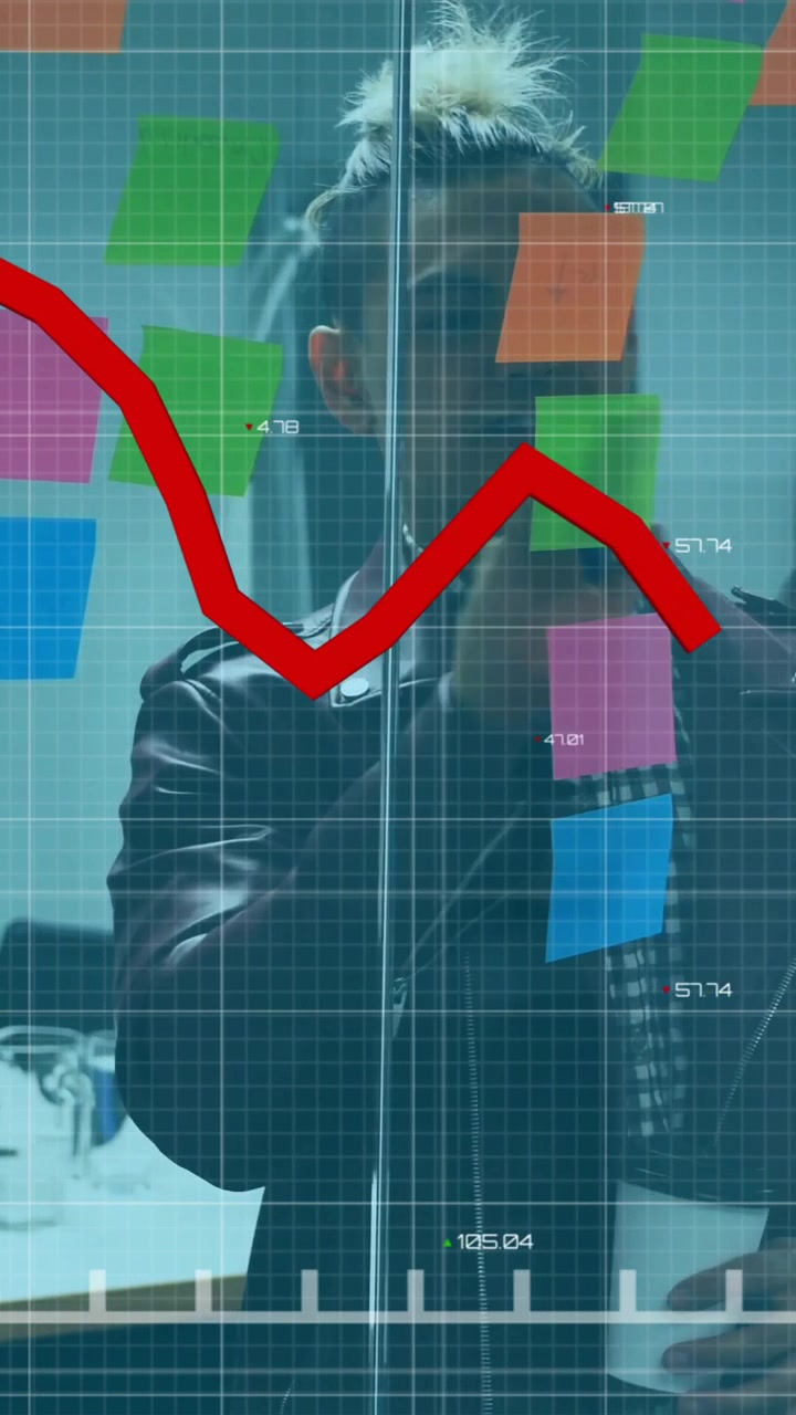 Animation of falling graph over diverse coworkers discussing strategy on sticky notes in office
