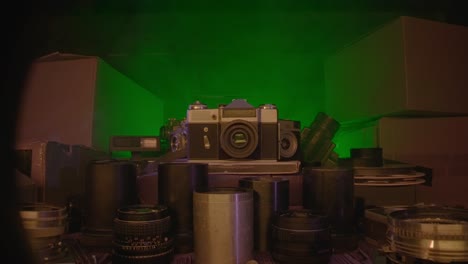vintage camera and accessories in a studio setting