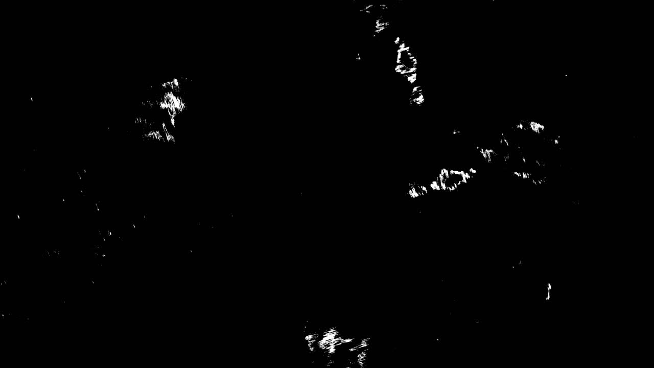 Abstract White Shimmering Particles on Black Background