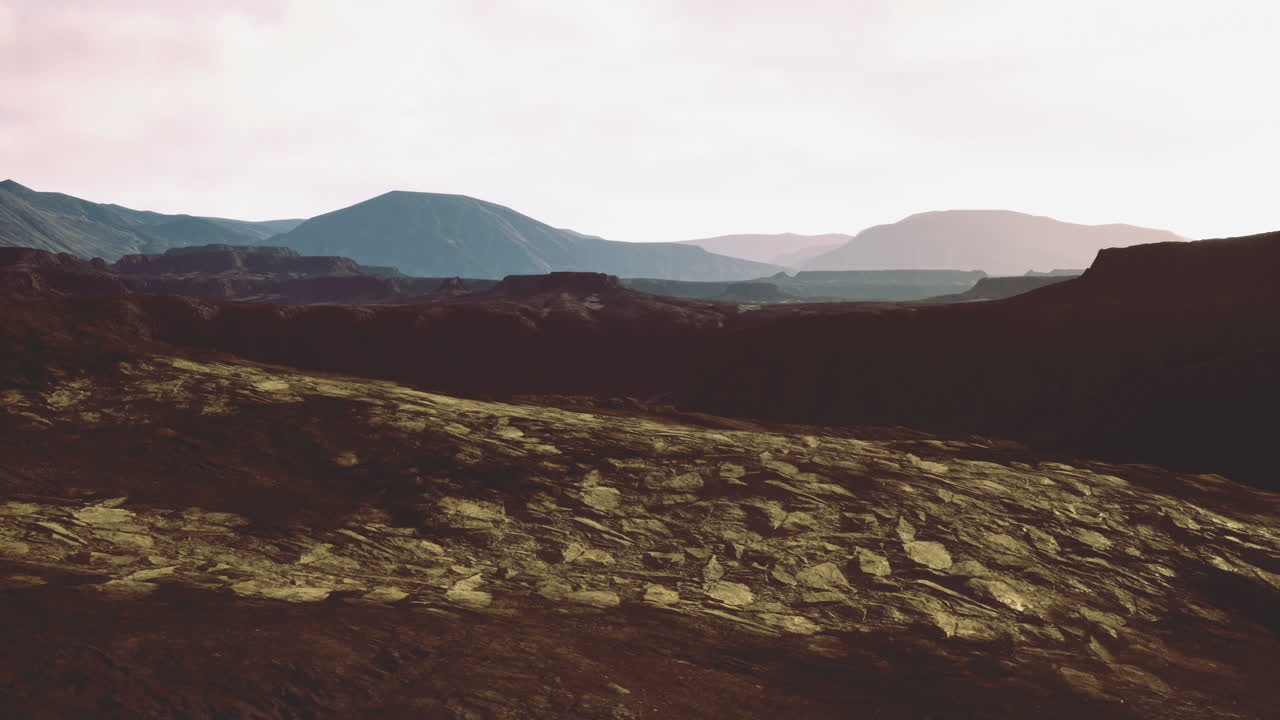 Majestic volcanic landscape captured during golden hour light near mountains