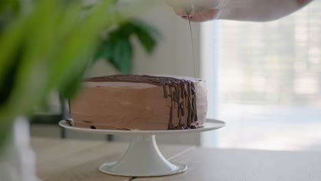 mesmerizing slow-motion chocolate cake decorating by a skilled amateur caucasian baker