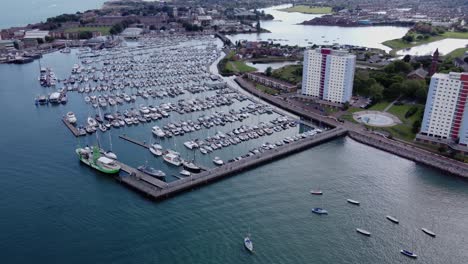 Aerial-View-Of-Ships-Dock-At-Haslar-Marina-In-Gosport-Town,-Hampshire,-Southeast-England