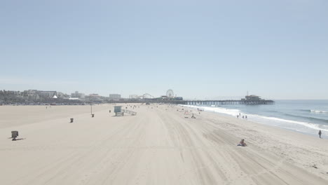 tropical weather has many outside at the beach to enjoy the day