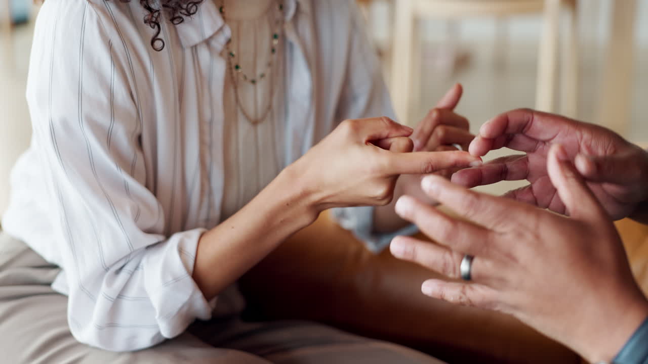 Close-up of a conversation between two people