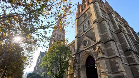 people walking by st. paul's cathedral, melbourne