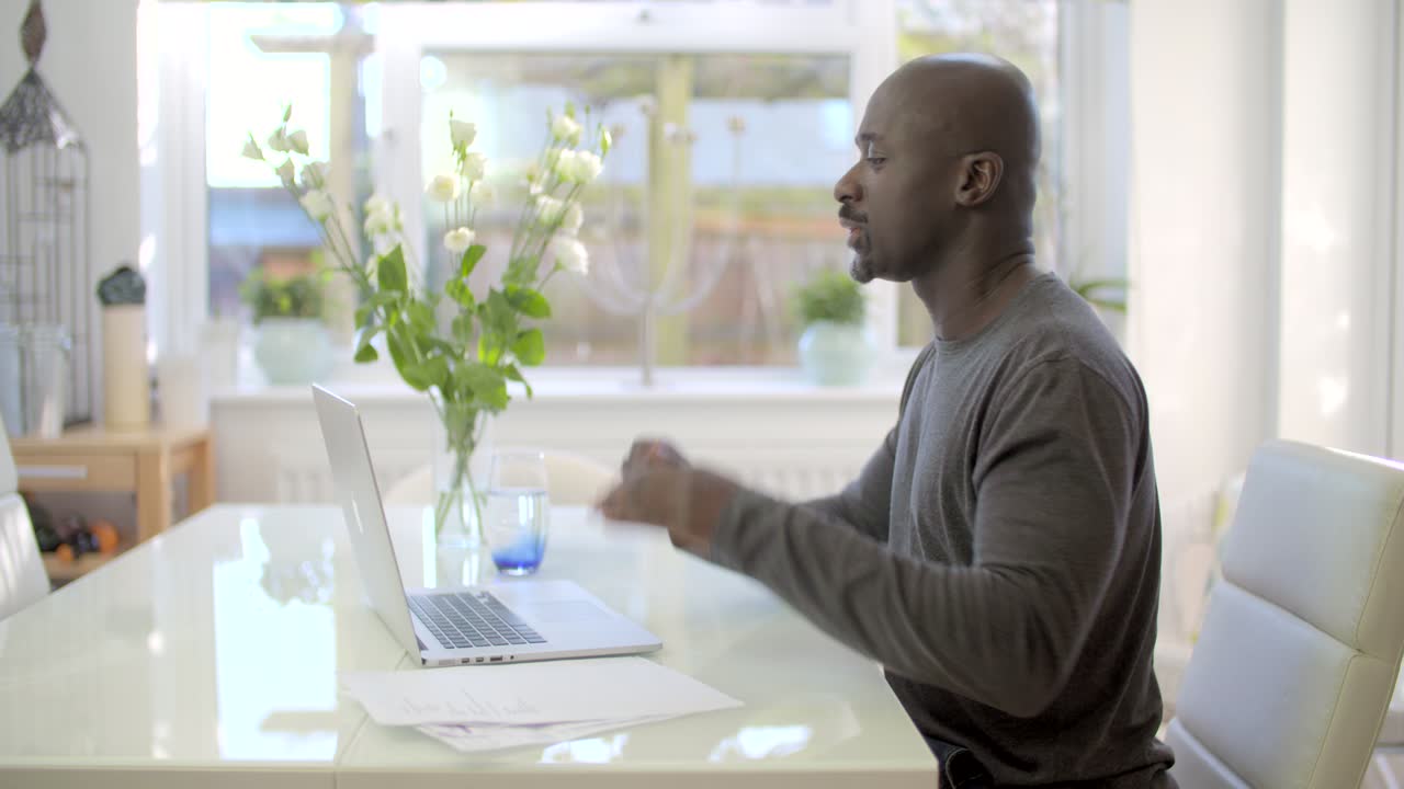 Stressed Man Paying Bills