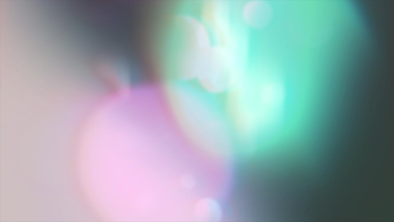 Dynamic Abstract Bokeh Lights with Pink and Green Hues