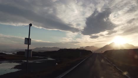 pov car driving the ring road during a beautiful sunset in the westfjords of iceland