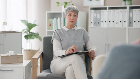 a therapist sitting in her office