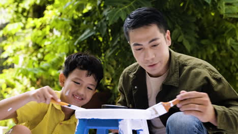 Asian-man-and-boy-in-the-backyard