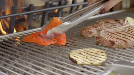 Close-Up-Shot-Of-Orange-Pepper-Steaks-On-Grill