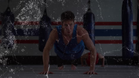 Doing push-ups, man in blue tank top with animation overlay in gym