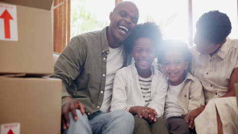 happy black family, box and relax in new home