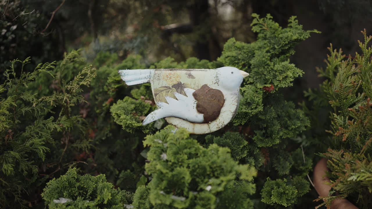 Decorative Metal Bird in Garden