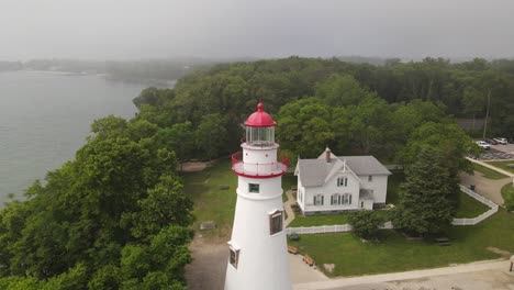 marblehead lighthouse along lake erie in ohio drone fly away