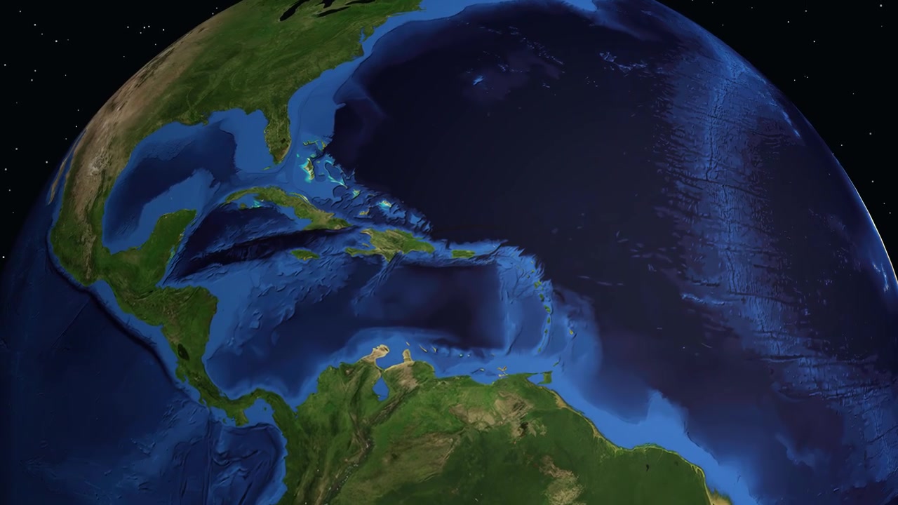 A digital globe rotates and zooms into La Romana, Dominican Republic, with location data overlay