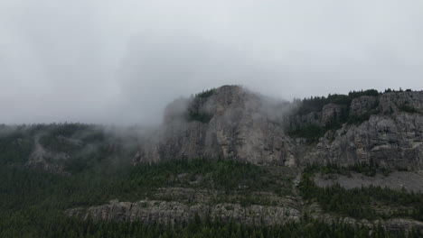 aerial view of a misty mountain on an ominous cloudy day