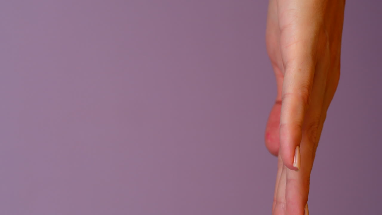 Stack of Pink Sprinkled Donuts