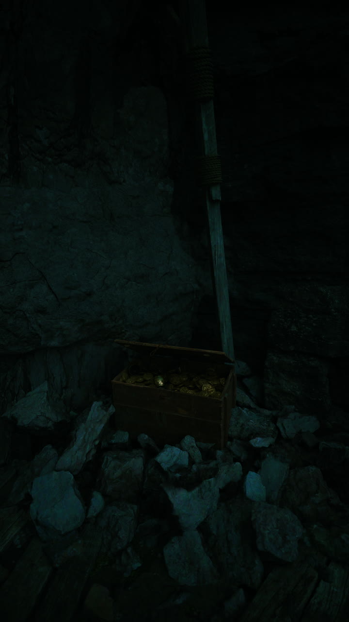 Treasure chest hidden in dark cave among rocks waiting for discovery