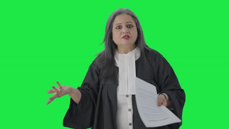 Indian-senior-female-lawyer-fighting-the-case-Green-screen