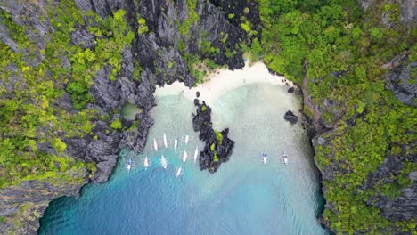 Aerial-top-down-perspective-of-bangka-outrigger-canoes-of-elnido-palawan