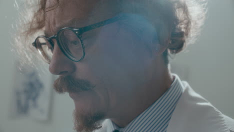 close up of psychiatrist talking to patient in sunlit hospital ward