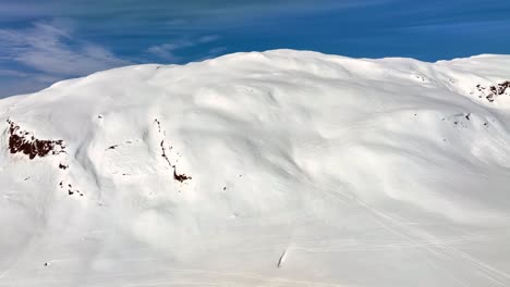 Ski-tracks-crisscross-slope-in-back-country-of-Myrkdalen,-Norway