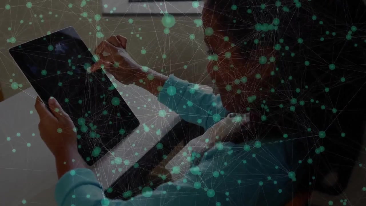 Girl reaching for black tablet, navigating interface, exploring network-node graphics technology