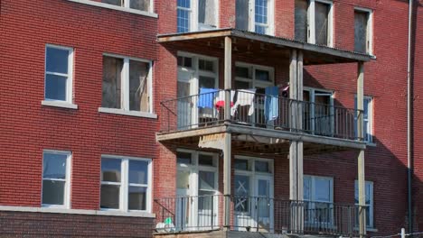 Laundry-blows-on-the-back-porch-of-a-tenement