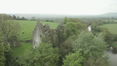 Fortified-House-Of-Dromaneen-Castle-Near-Blackwater-River-In-County-Cork,-Ireland