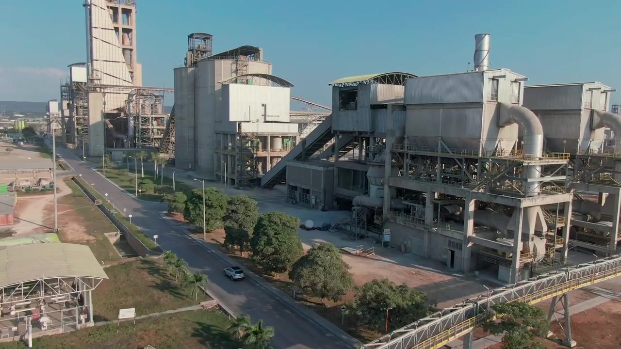 An aerial perspective of the manufacturing area. Aerial view of industrial cement factory production plant near Cartagena