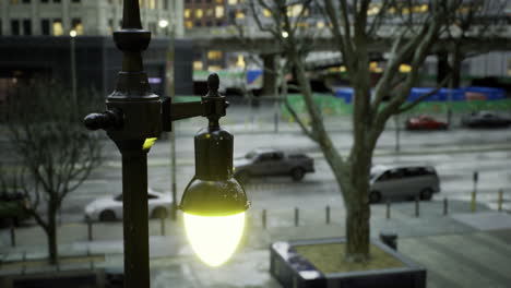 urban landscape featuring a vintage streetlight illuminating an empty plaza