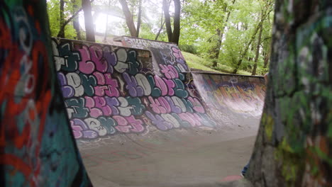 caucasian boy skateboarding in the park.