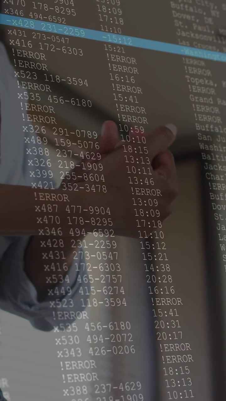 Female tech worker rubbing hands, reacting to ERROR terminal overlay appearing on glass