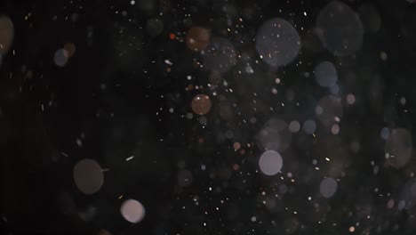 bokeh de partículas abstractas flotantes sobre fondo oscuro