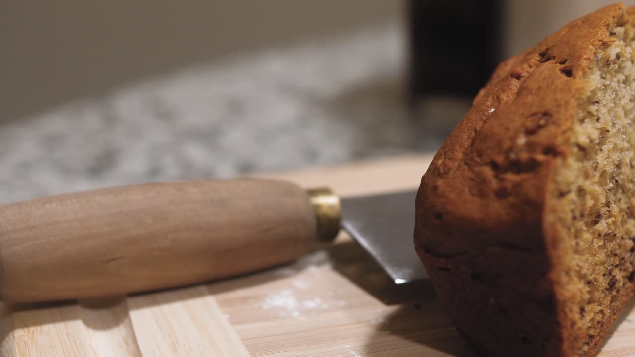Macro shot of Fresh Loaf of Sliced Homemade Banana Bread with left to right slide