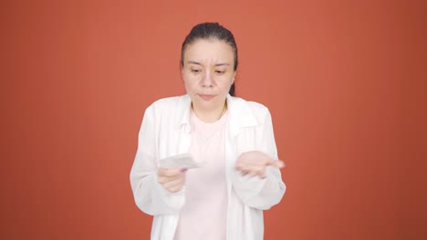 angry woman with high bill.
