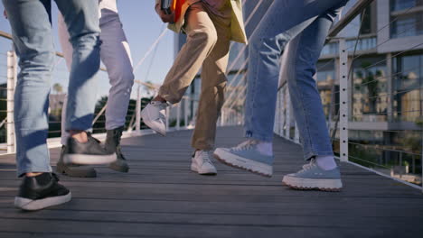 people walking on a bridge
