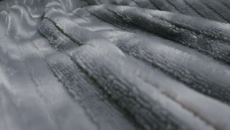 closeup of an expertly tailored suit that beautifully showcases its sophisticated buttons and fine fabric texture