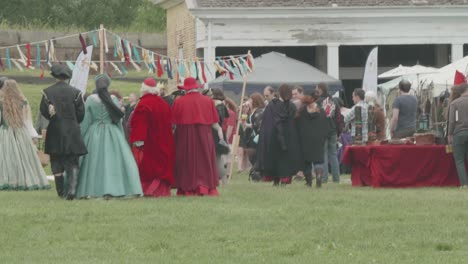 merchandise vendors at a renaissance fair, with spanish inquisition costumes, philadelphia renaissance fair, fort mifflin, pennsylvania