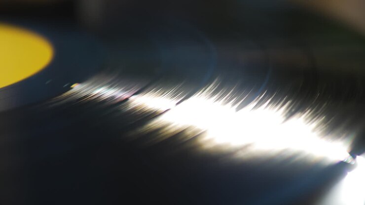 Close Up of a Spinning Vinyl Sun Reflection