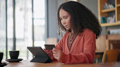 tablet, credit card and woman in cafe