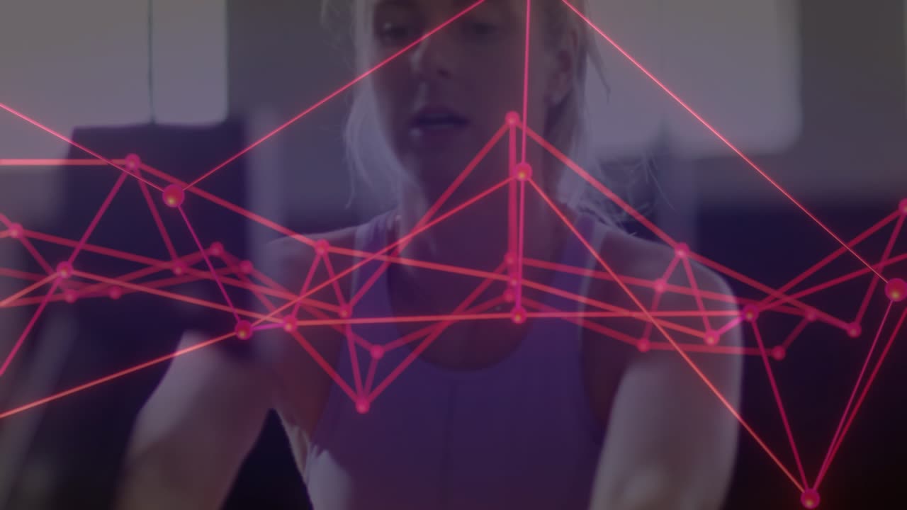 Adult woman sitting on sofa reaching, causing neon mesh drifting across mid, leaving face seen tech